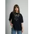 Жіноча оверсайз футболка чорного кольору з геометричним візерунком "Меланія" Жіноча оверсайз футболка чорного кольору з геометричним візерунком "Меланія"